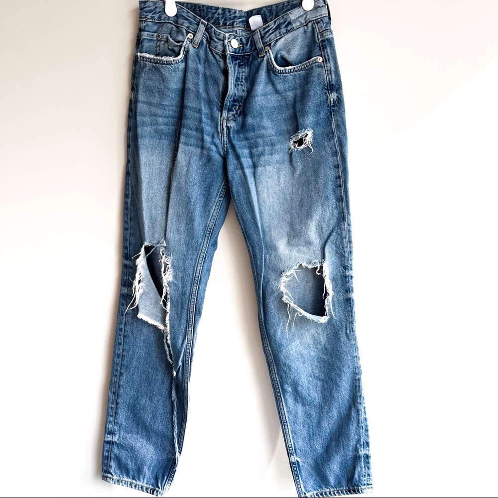 Denim ripped blue jeans